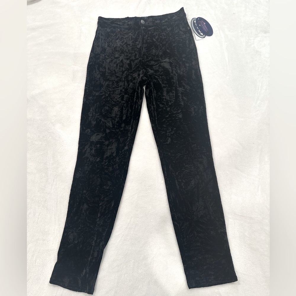 Pants are new and a size 8. The material has a velvet, soft stretch.
